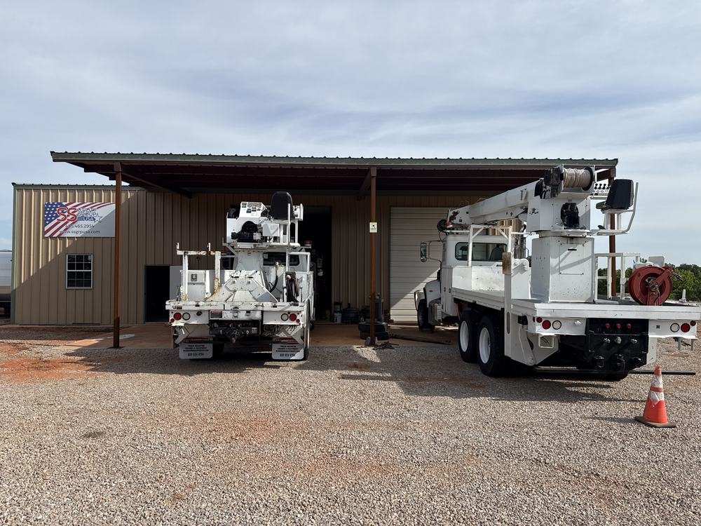 Service trucks parked at the SS Utility Group shop